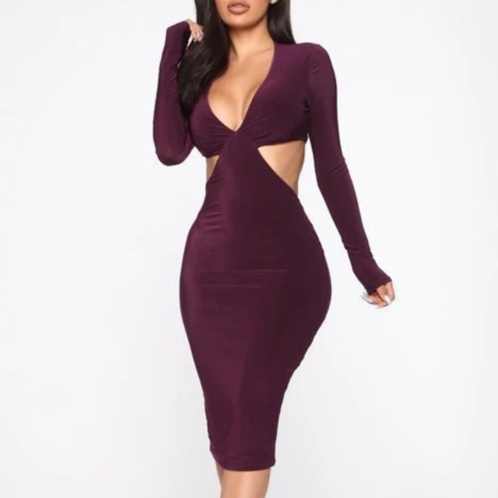 Beautiful, purple, snug fitting dress that has never been worn .